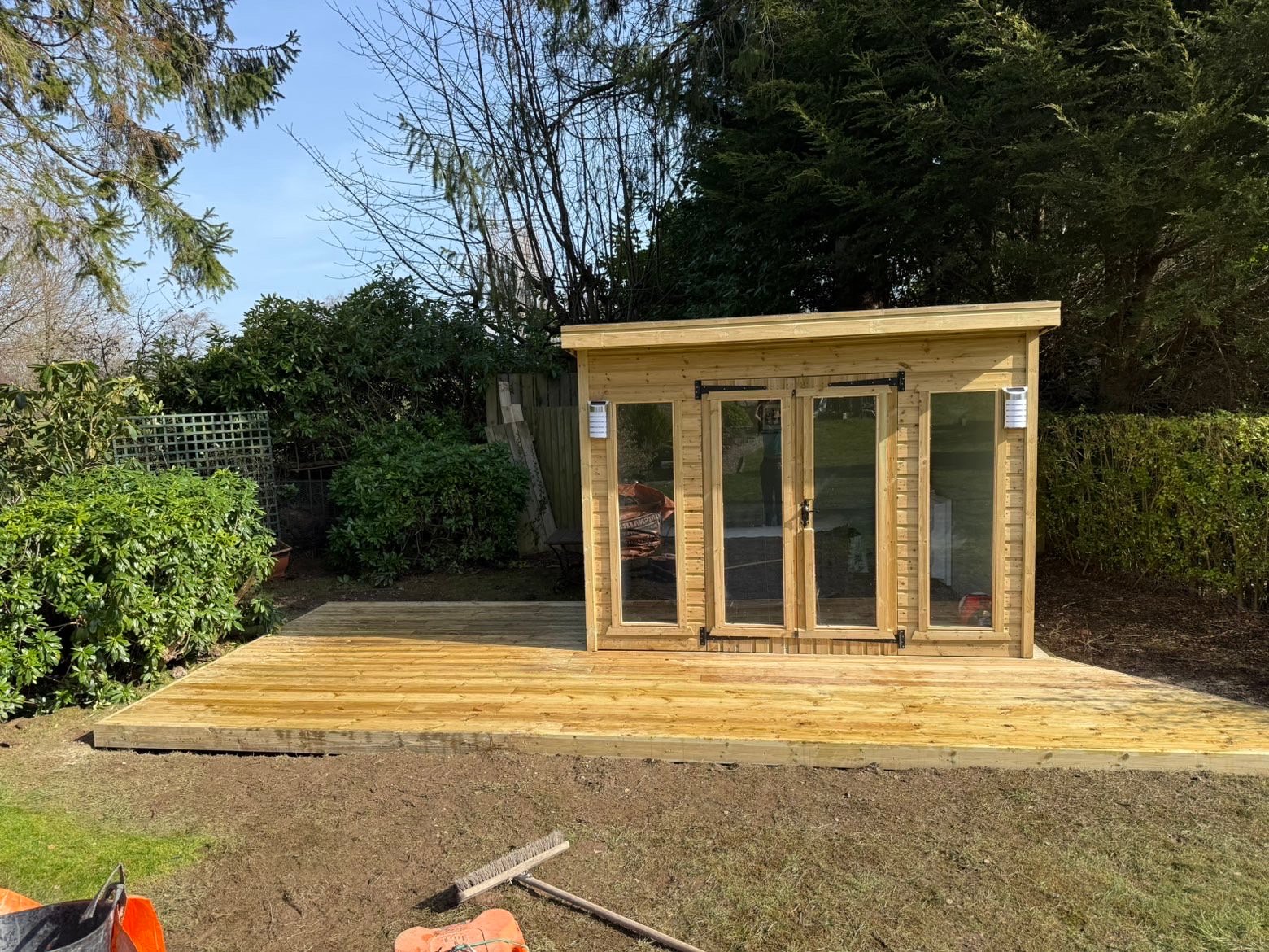 Timber decking with garden room installed by FH Contracts Scotland in Glasgow