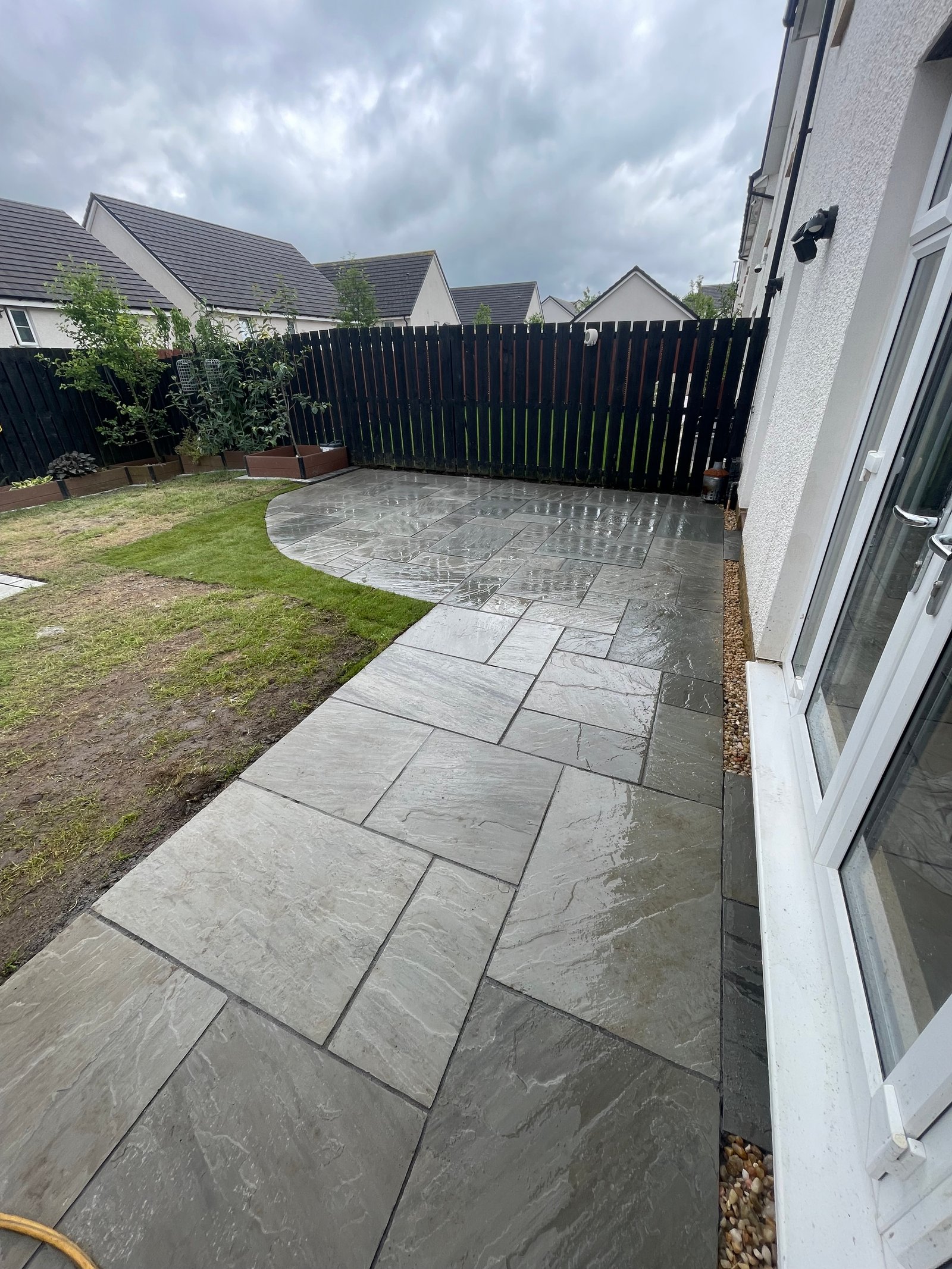 Indian sandstone patio installed by FH Contracts Scotland in Glasgow